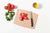 Epicurean Kitchen Series Cutting Board in Natural with assorted fruits and vegetables ready to be chopped using a Victorinox Chef's Knife